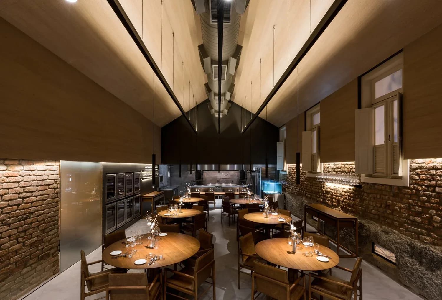 The softly lit dining room at Oteque