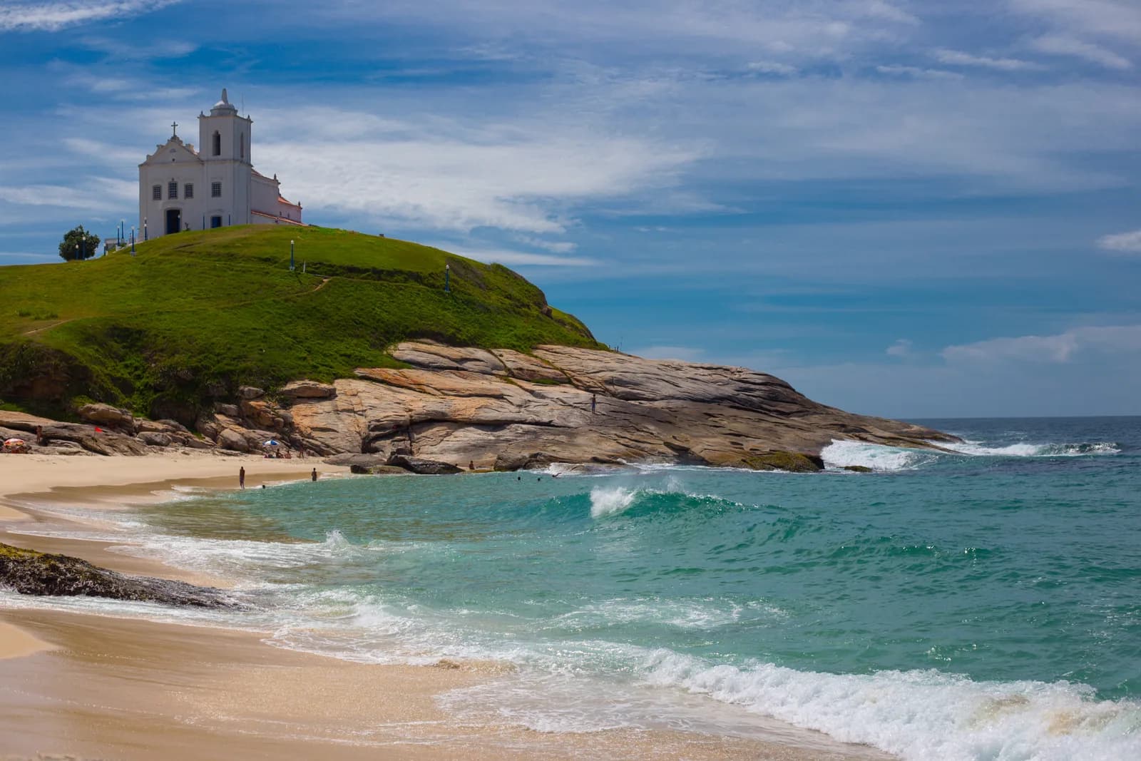 Saquarema's coastline and white hilltop church beside the Atlantic